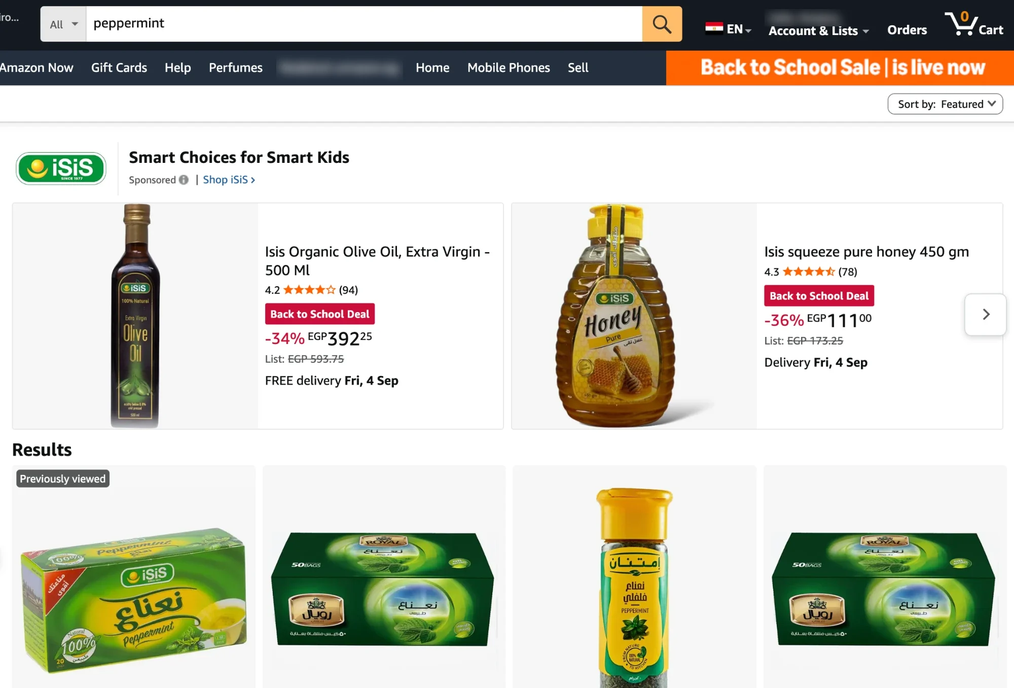 Amazon search for “peppermint” led by an iSiS Sponsored Brands ad, “Smart Choices for Smart Kids,” with Back to School Deal prices on olive oil and honey